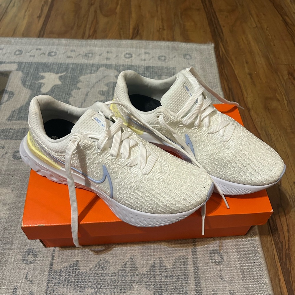 Nike Cream and Blue Running Shoes